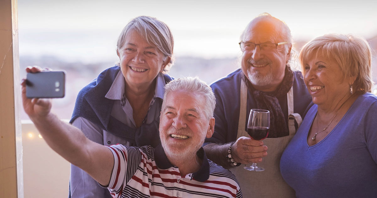 Group of older people taking a picture together